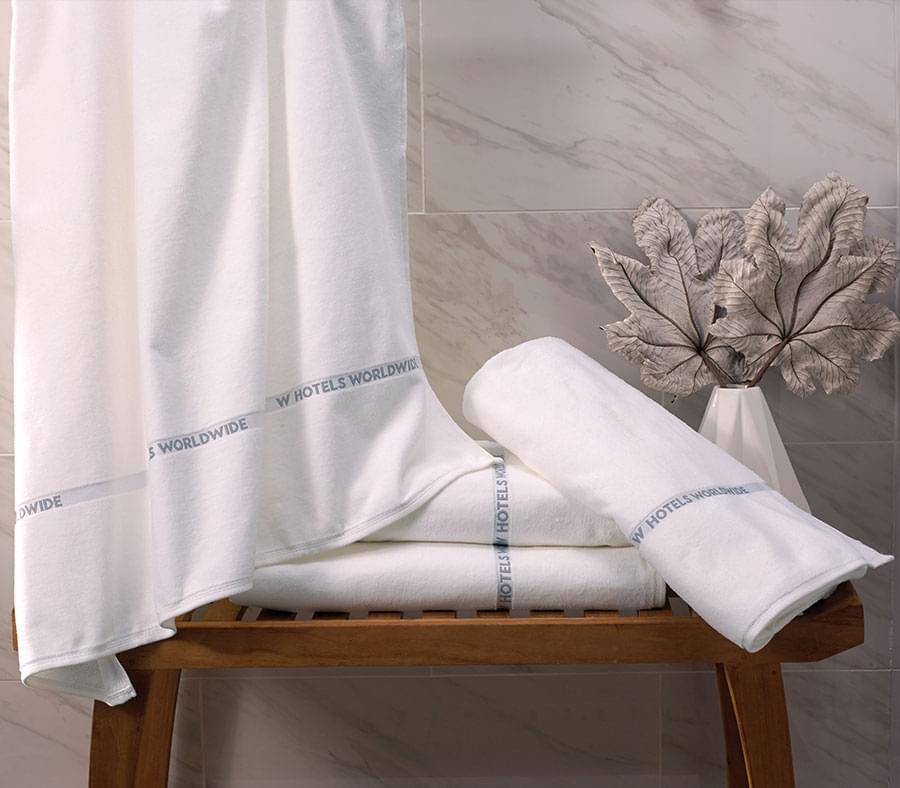 https://www.whotelsthestore.com/images/products/xlrg/w-hotels-pool-towel-WHO-320-PT-01-WH-WL_xlrg.jpg