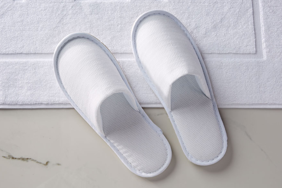 https://www.whotelsthestore.com/images/products/xlrg/w-hotels-textured-slippers-WHO-457-08-13-02-01-L_xlrg.jpg